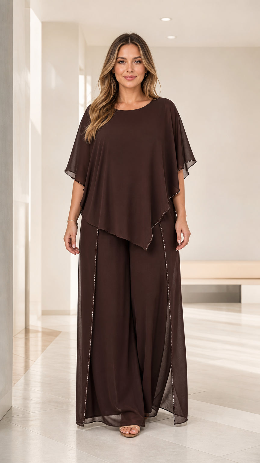 Full front view of women's chocolate brown chiffon capelet top and wide-leg pants set