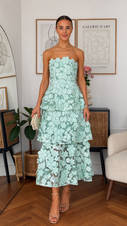 Front view of mint strapless 3D floral tiered midi dress