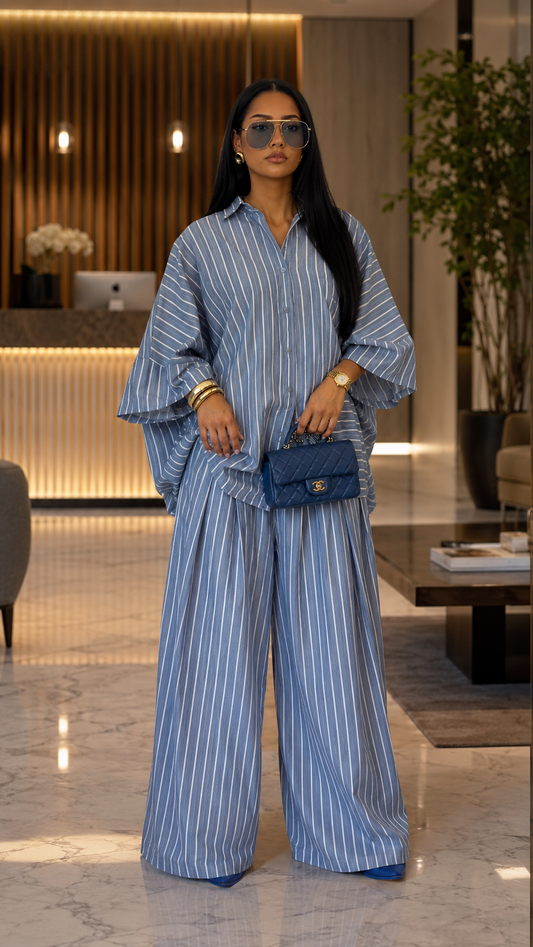 Front view of dusty blue striped oversized shirt and wide leg pants set