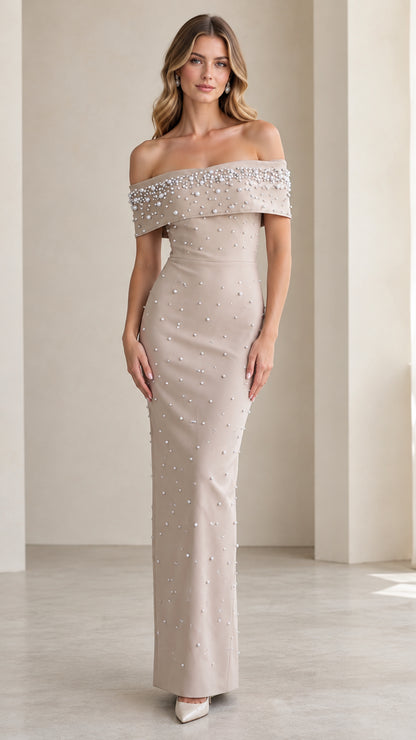 Front view of Champagne pearl embellished off-the-shoulder column evening maxi dress