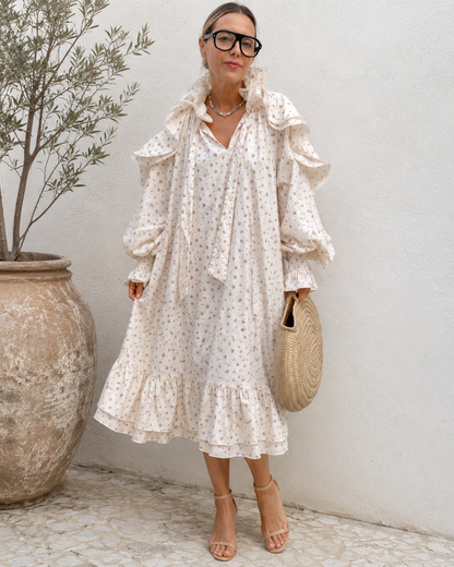 Front view of cream floral ruffle collar puff sleeve midi dress