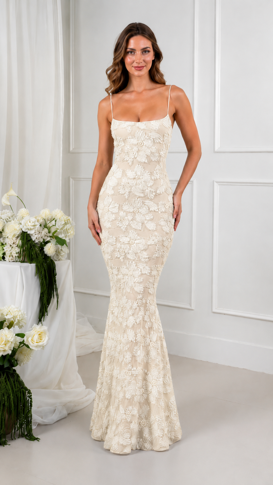 Front view of ivory floral lace mermaid maxi dress with spaghetti straps