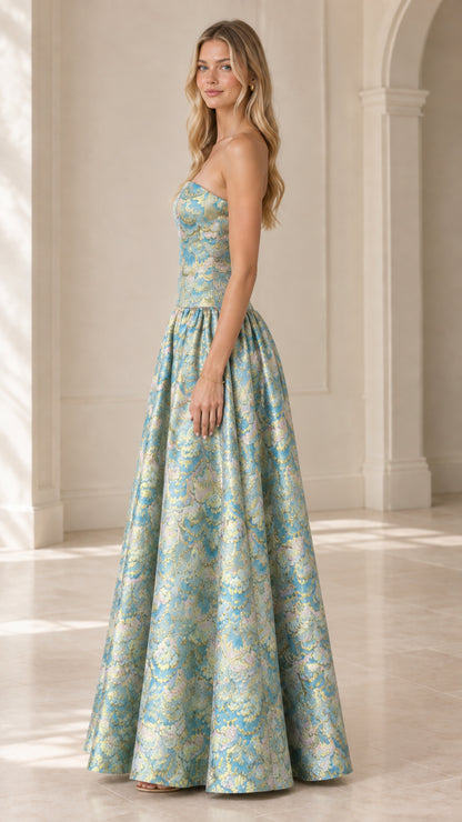 Side angle view of strapless aqua blue metallic jacquard formal evening dress