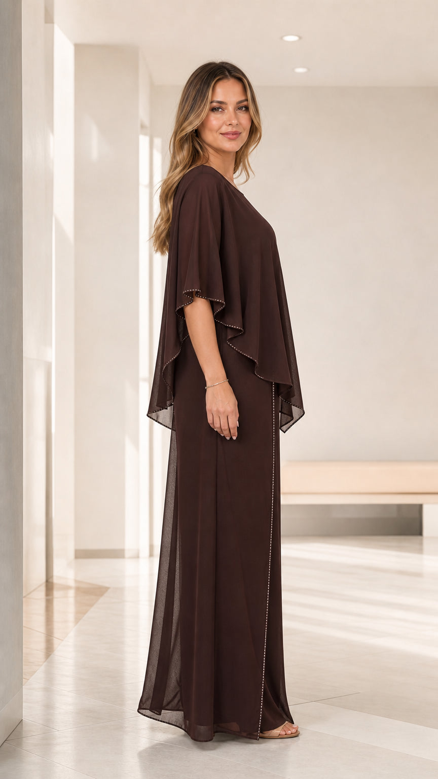 Side profile view showing the draped cape overlay of the chocolate brown evening pant set