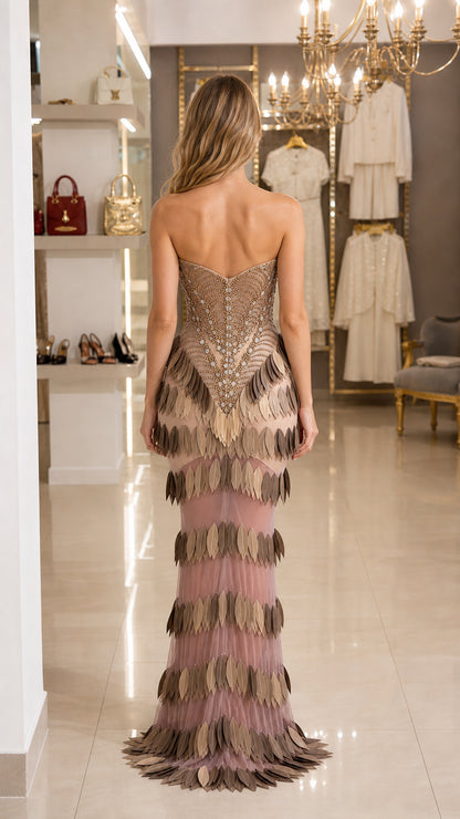 Back view of model in champagne crystal beaded formal gown