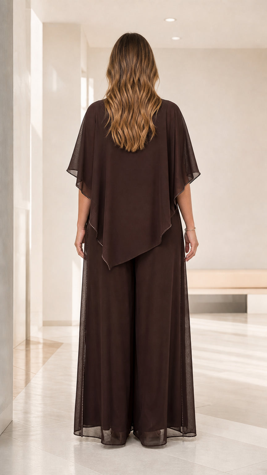Back view of the chocolate brown tiered chiffon capelet formal pant outfit