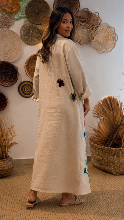 Back view of beige embroidered maxi shirt dress with long sleeves