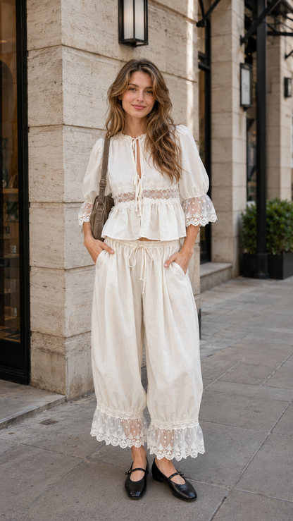 Cream lace inset peplum top and drawstring pants set front view