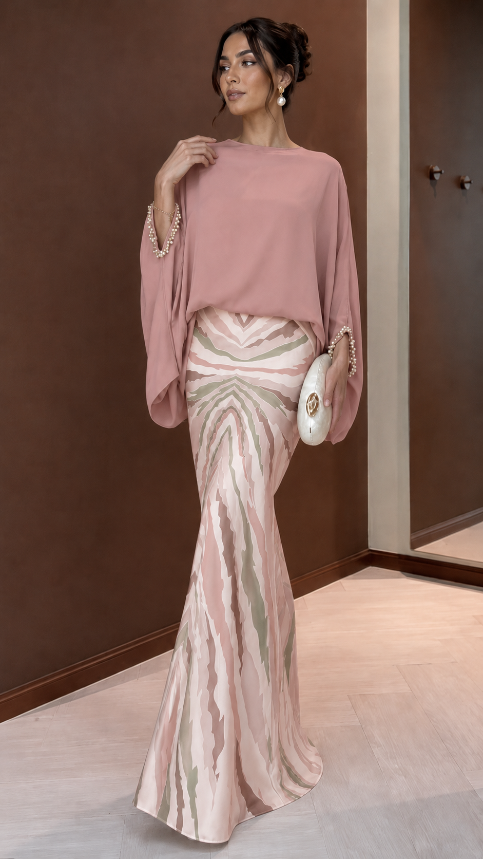 Blush pink batwing maxi dress with abstract mermaid skirt and embellished cuffs