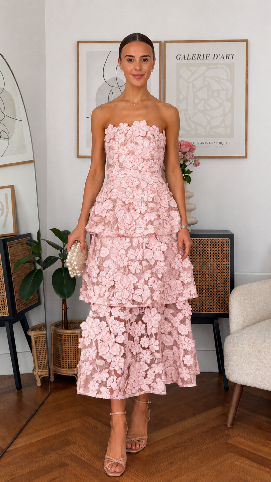 Front view of blush pink strapless 3D floral tiered midi dress