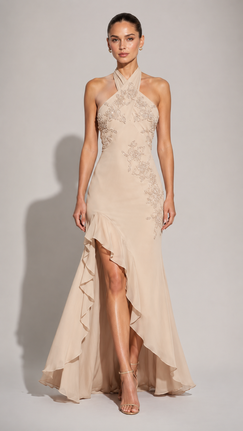 Champagne embellished halter high-low evening gown front view