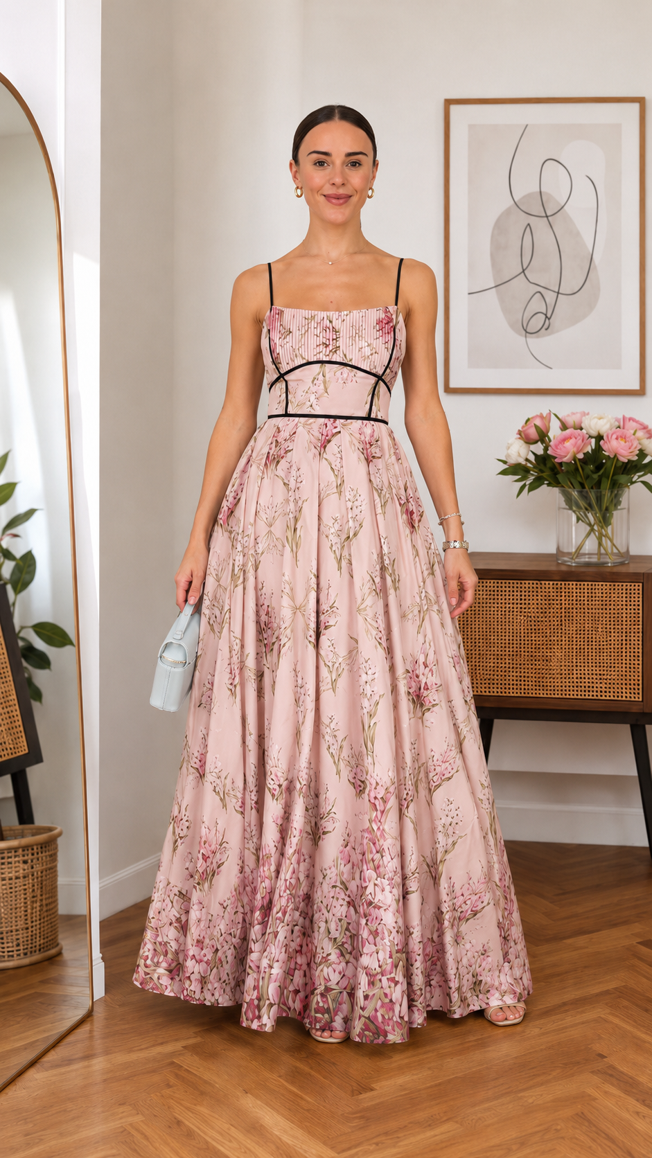 Front view of blush pink floral spaghetti strap maxi dress with full-length skirt