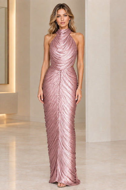 Model wearing rose pink metallic pleated halter maxi formal dress