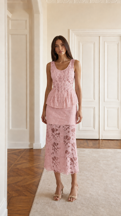 Front view of blush pink sleeveless lace peplum midi dress set