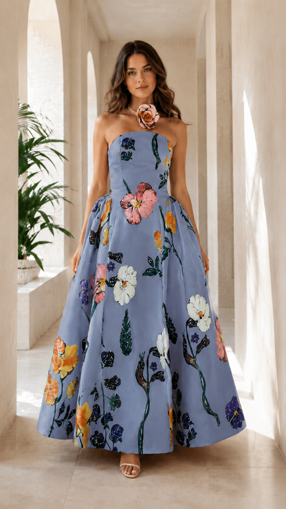 Front view of dusty blue strapless floral ball gown maxi dress