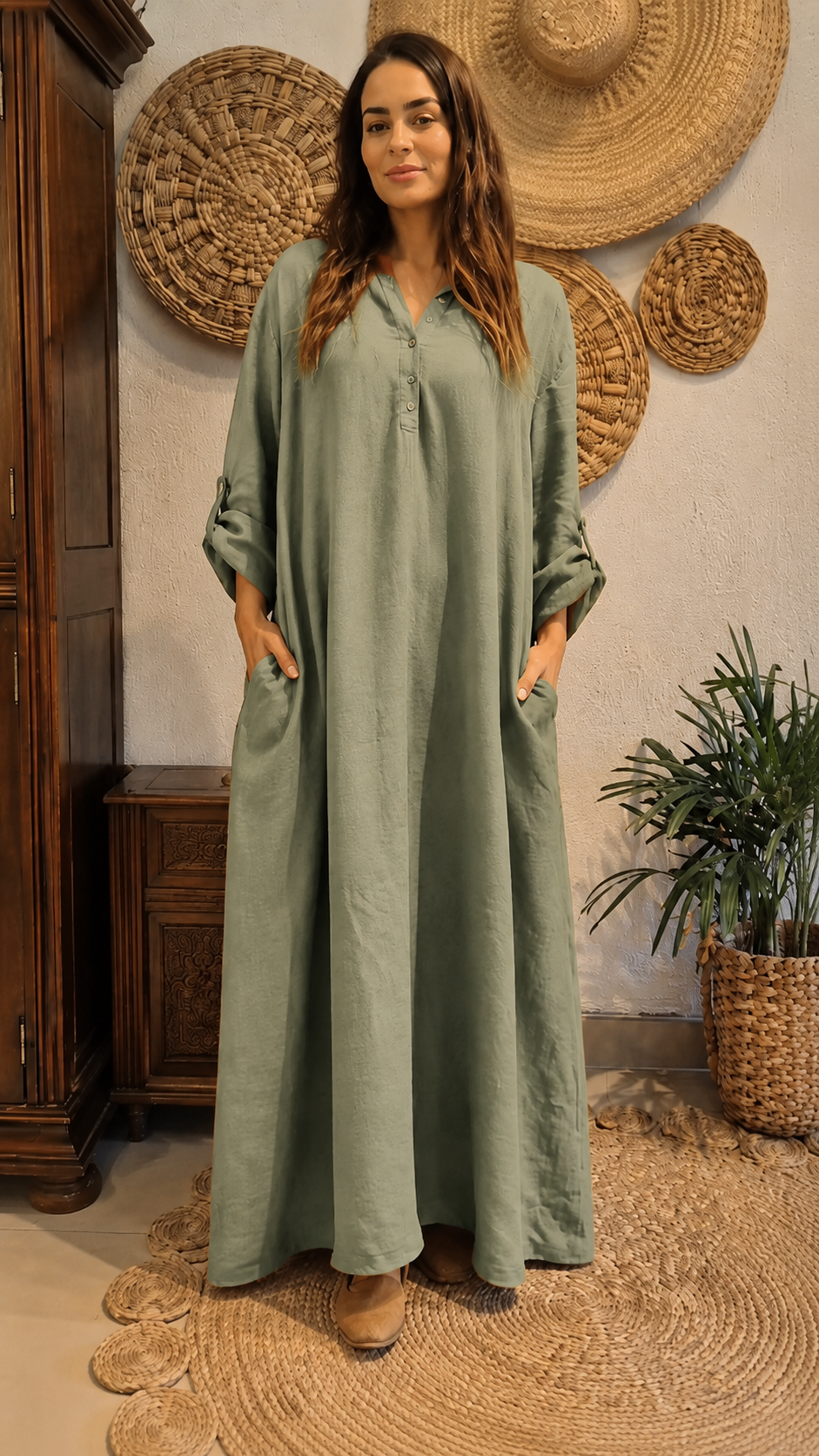Front view of sage green loose maxi kaftan dress with pockets