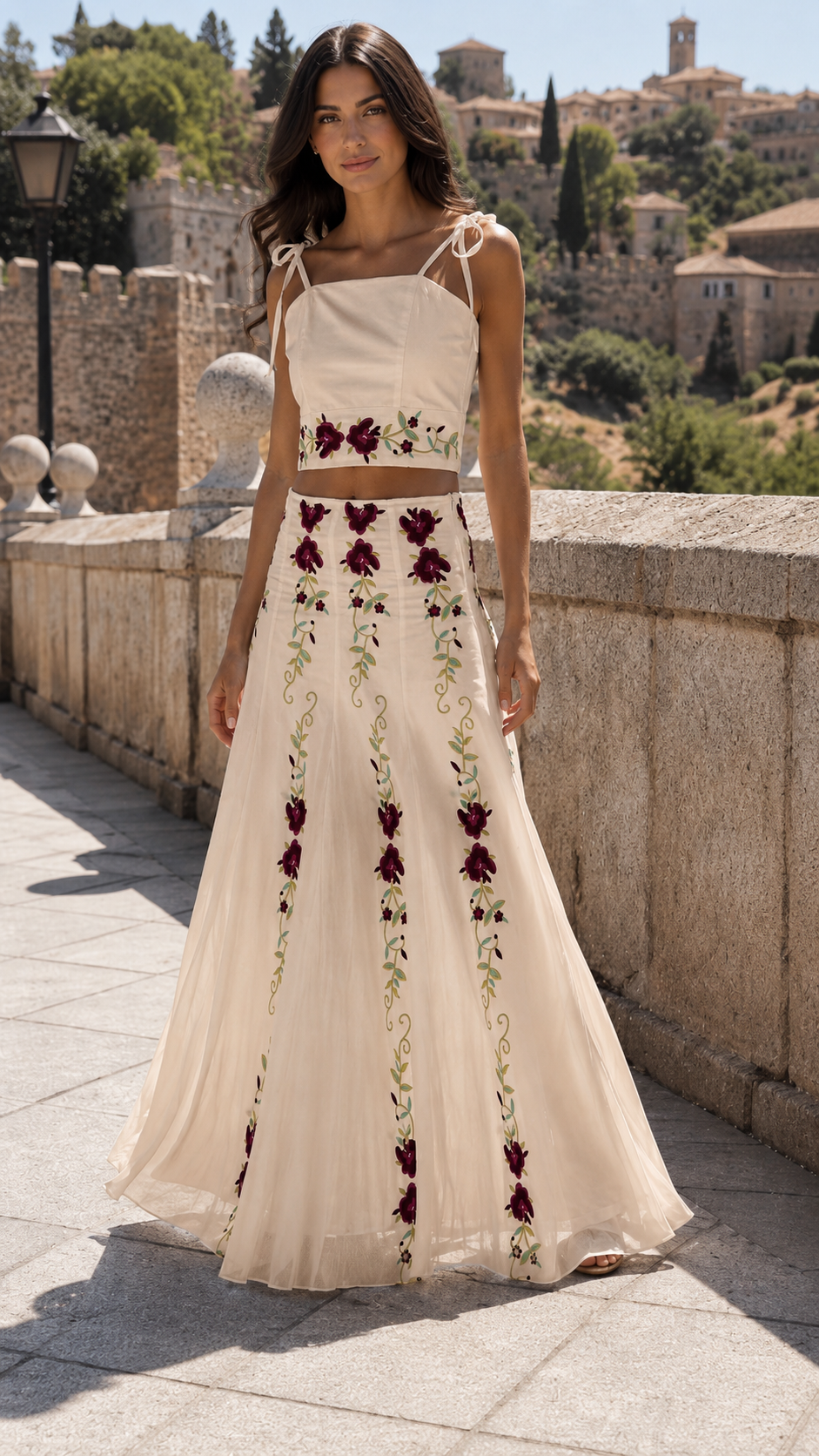 Model wearing a cream floral embroidered two-piece maxi skirt set