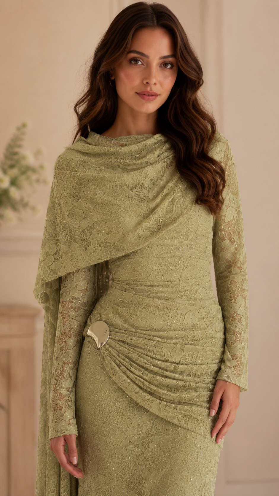 Close-up of sage lace formal dress with draped neckline, long sleeves, and ruched waist