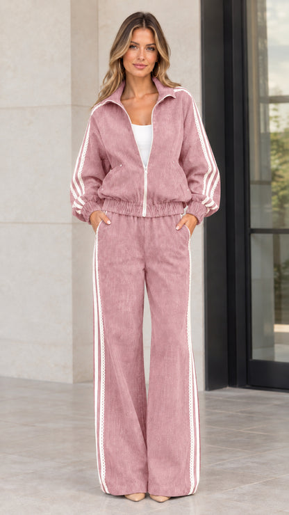 Front view of woman wearing dusty pink corduroy two-piece tracksuit set