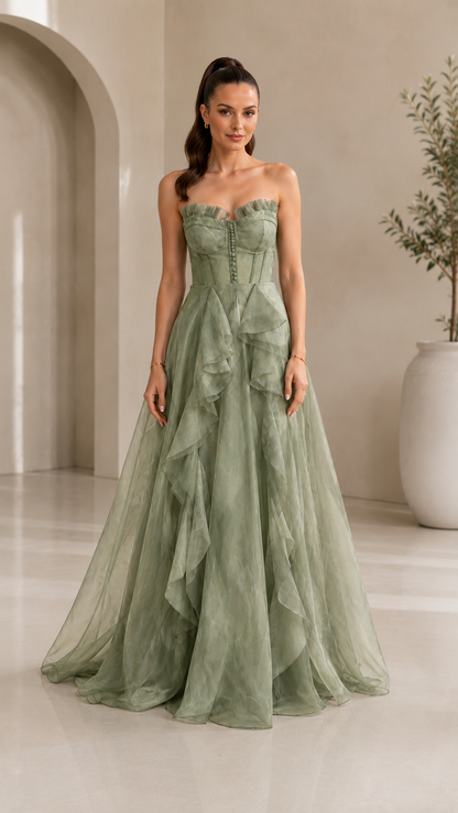 Front view of sage green strapless evening dress with ruffle panels and full-length skirt
