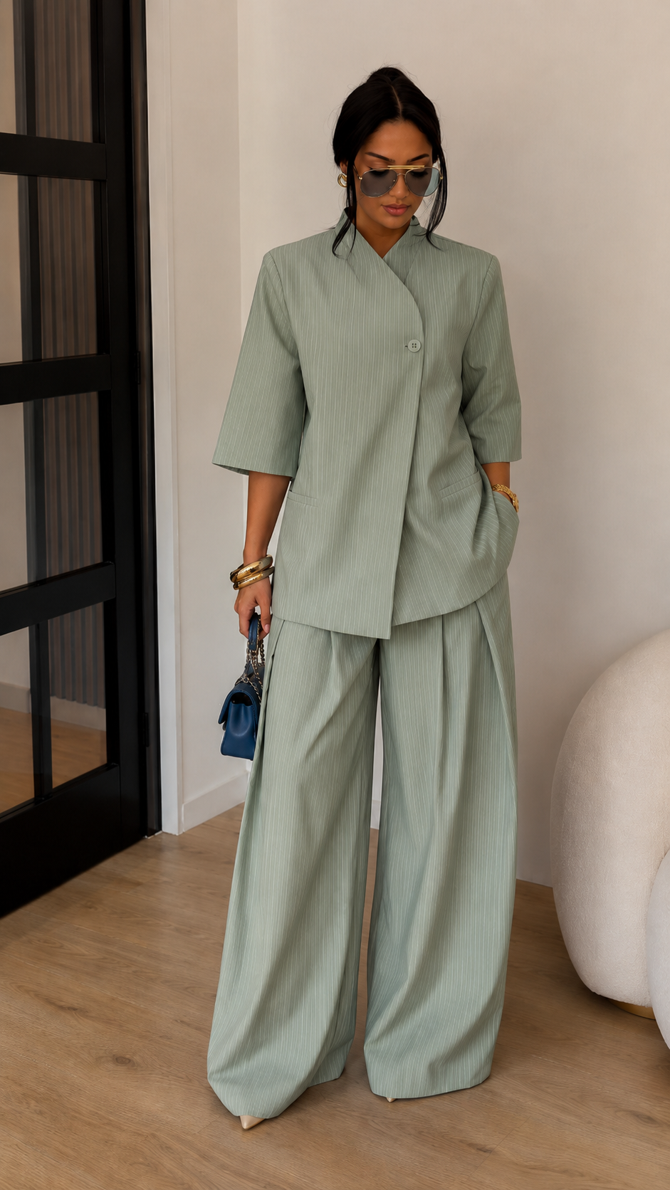 Front view of sage green matching set with three-quarter sleeves and wide-leg pants