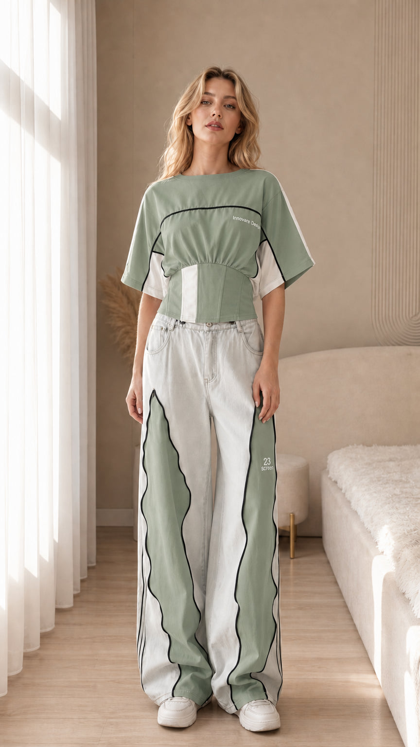 Front view of the sage green color block cropped sport top