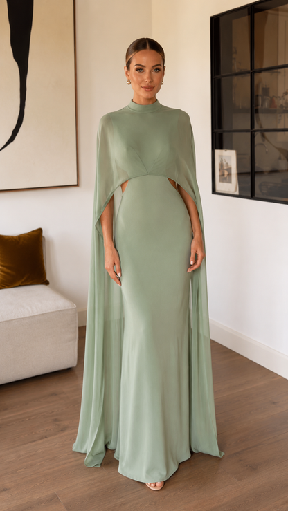 Front view of sage green mock neck cape sleeve floor length dress
