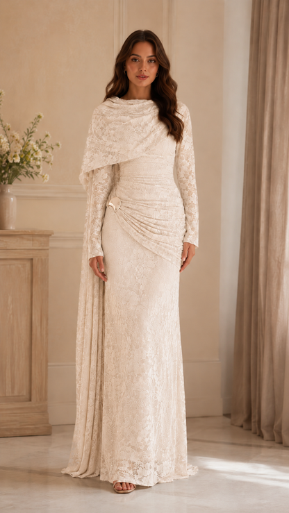 Front view of cream lace maxi evening dress with long sleeves and draped shoulder overlay