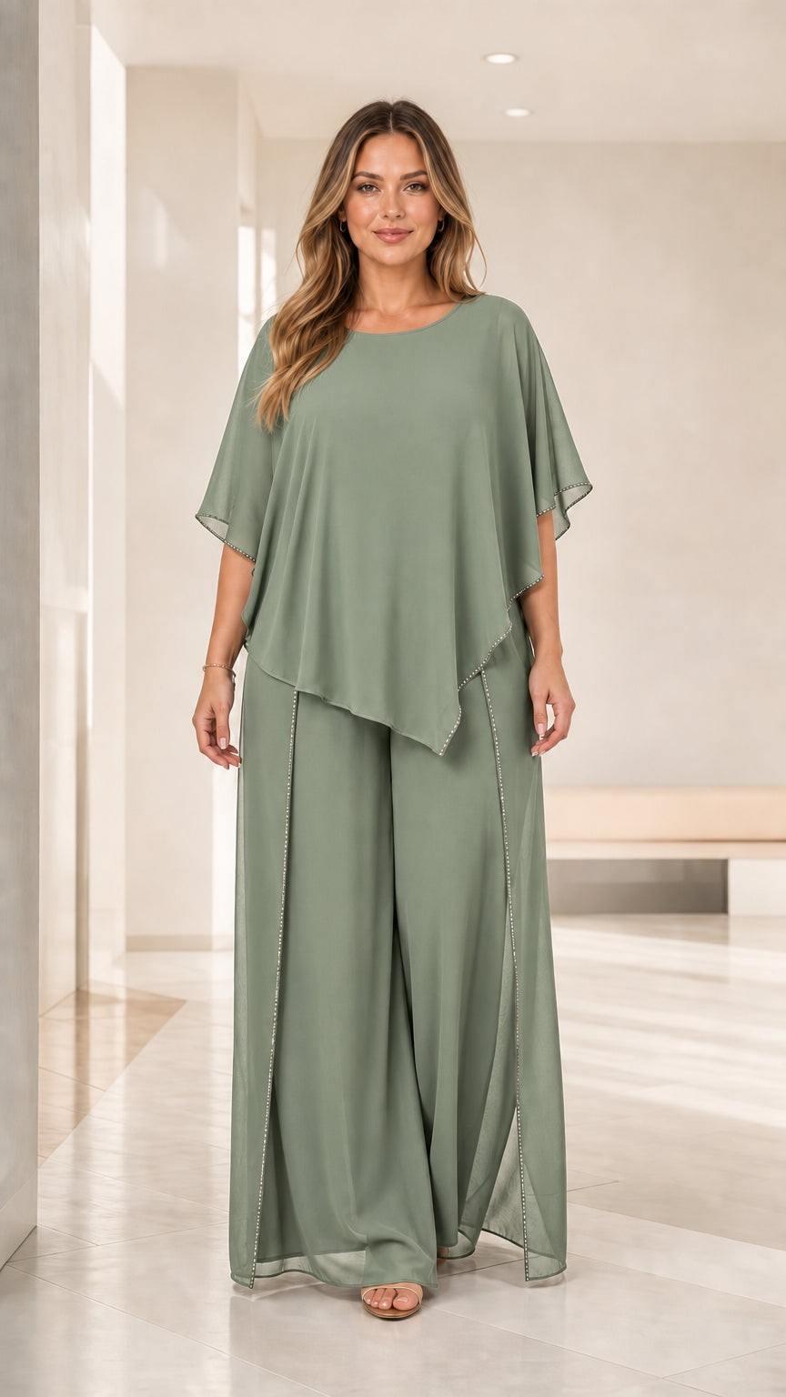 Full front view of the sage green chiffon overlay capelet top and wide leg pants set