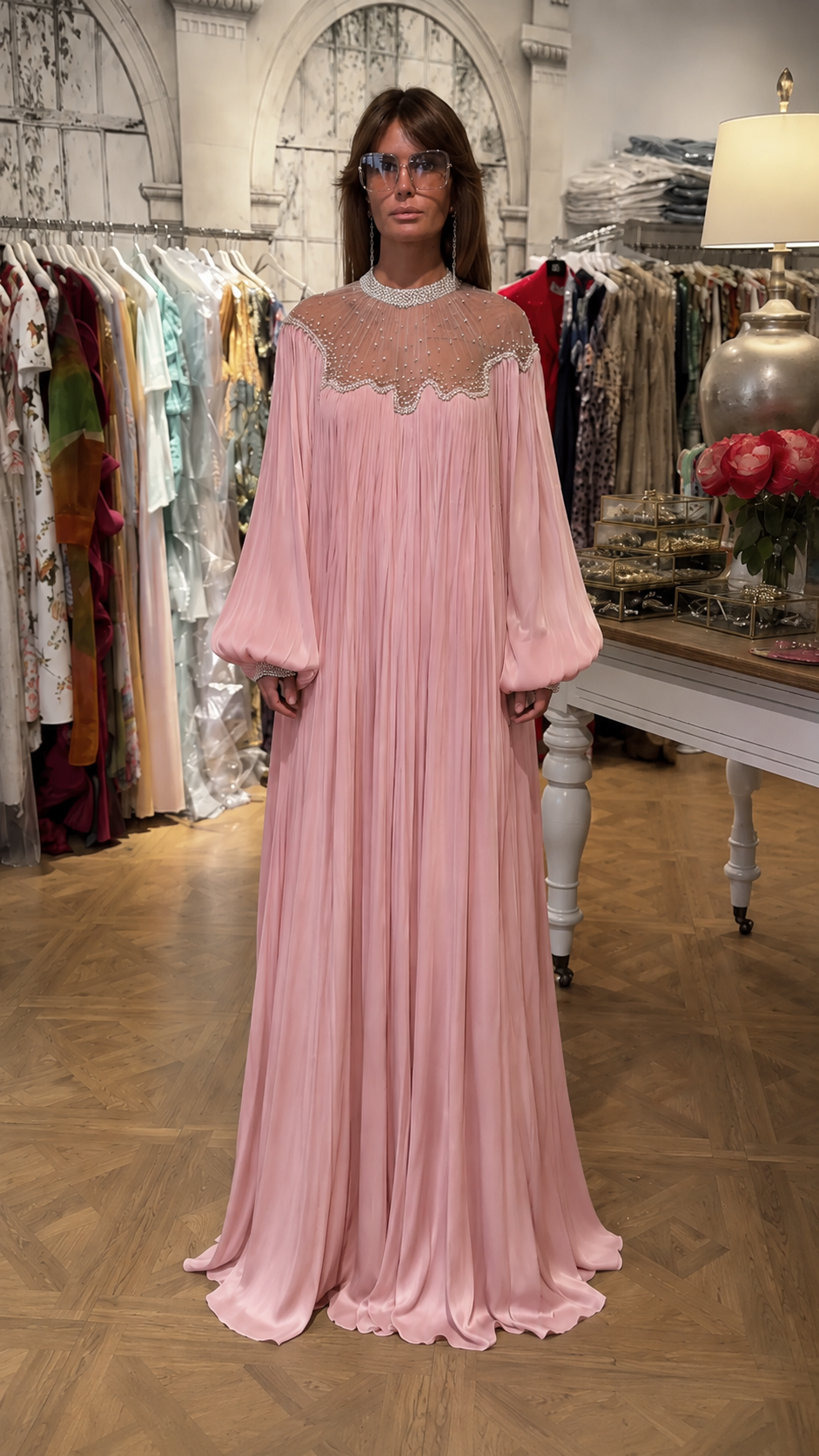 Front view of blush pink pleated maxi dress with long balloon sleeves and beaded yoke