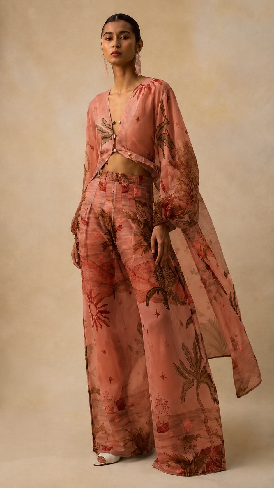 Front view of coral printed coordinated wide-leg pants set with flowing overlay