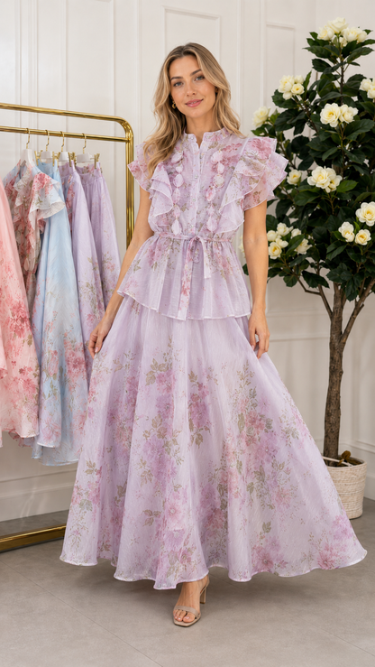 Front view of lavender floral maxi dress with ruffle details and maxi-length skirt