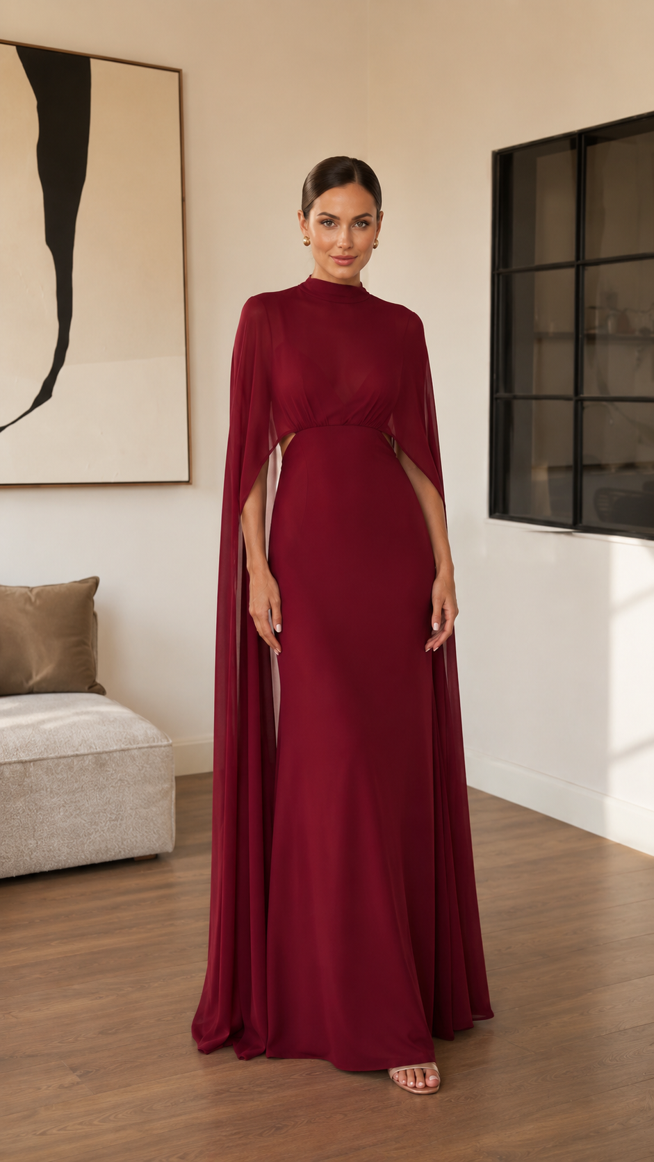 Front view of burgundy mock neck cape sleeve maxi evening gown