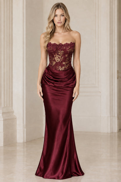 Burgundy red strapless satin formal gown with lace corset top
