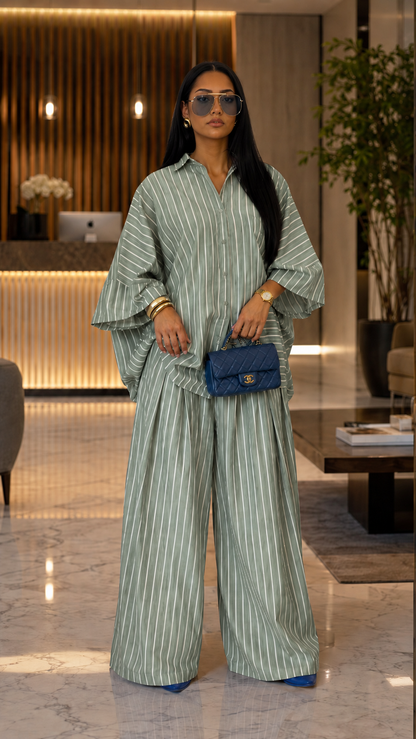 Front view of sage green striped oversized shirt and wide leg pants set