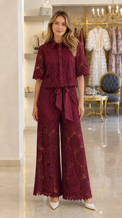 Model wearing burgundy wine red floral lace button-down top and wide-leg pants set