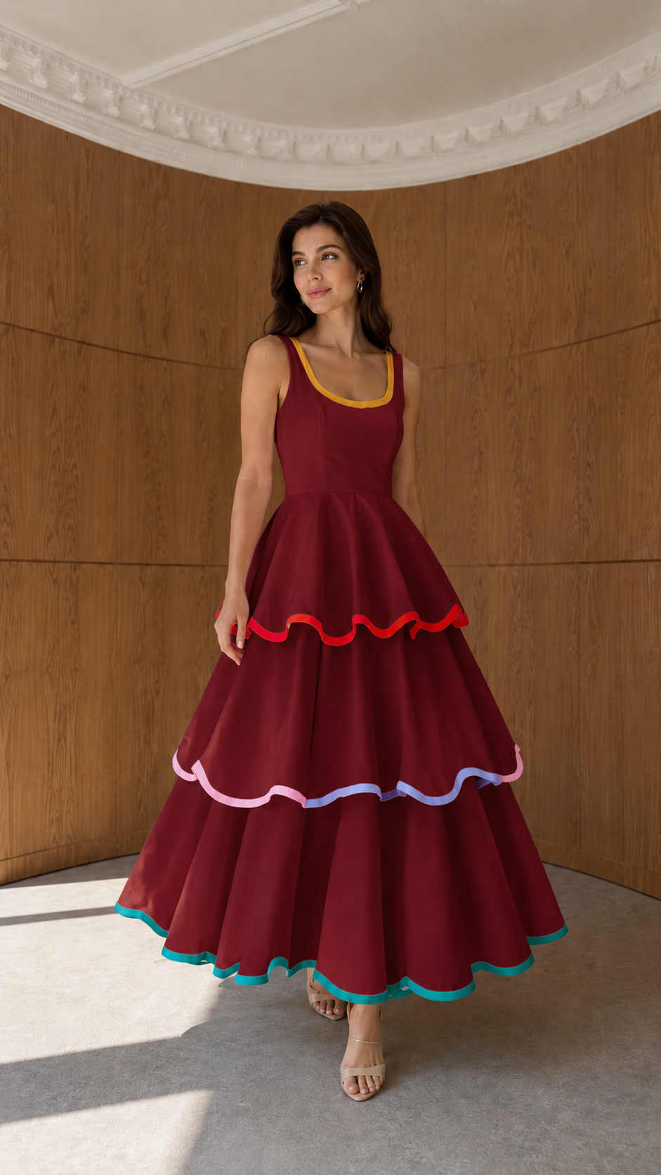 Front view of burgundy tiered sleeveless maxi dress with contrast edging