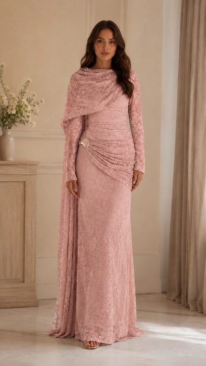 Front view of blush pink lace evening dress with cape overlay and full-length silhouette