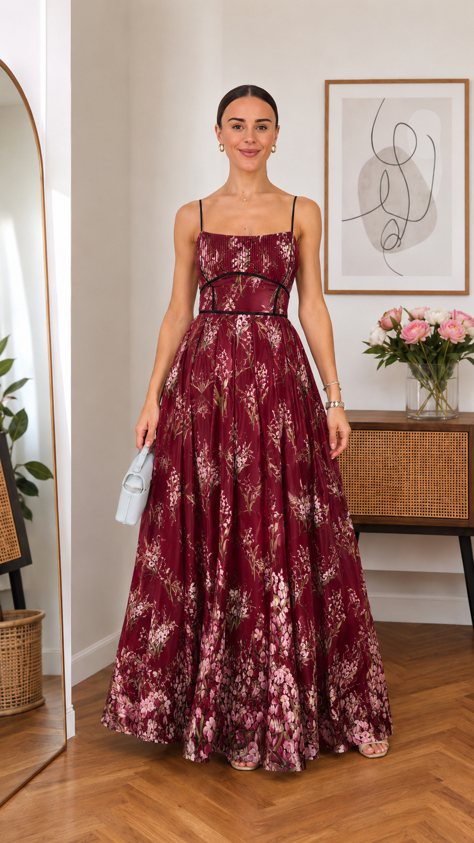 Front view of burgundy floral spaghetti strap maxi dress with contrast waist detail