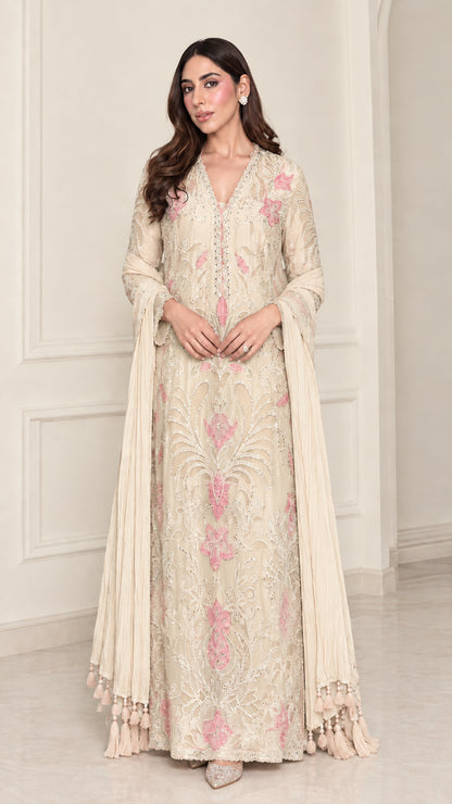 Full-length view of elegant cream floral embroidered evening maxi gown