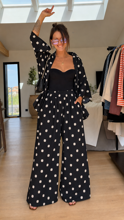 Black polka dot wide leg pants and kimono set styled for a statement look