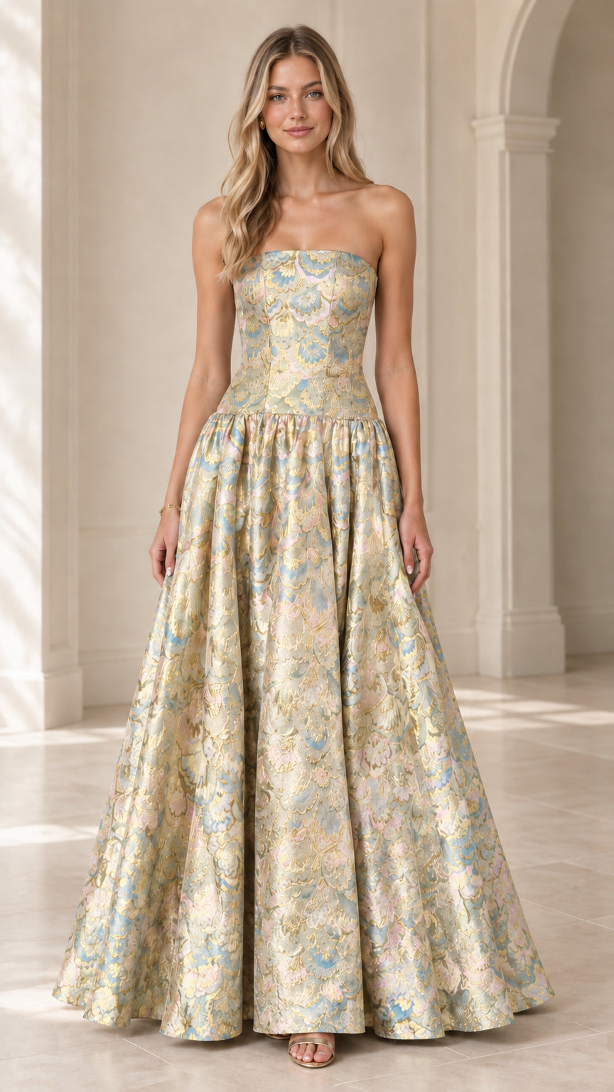 Model wearing strapless champagne gold metallic jacquard formal evening dress